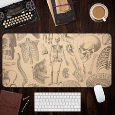 a desk with a keyboard, mouse and various items on it including a skull rug