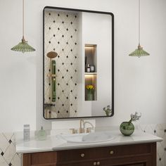 a bathroom with a sink, mirror and lights on the wall next to each other