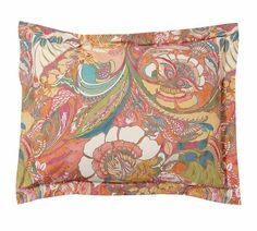 an orange and pink floral pillow case on a white background with the words, paisley