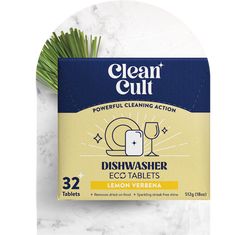 a box of dishwasher eco tabs on a marble surface with palm leaves