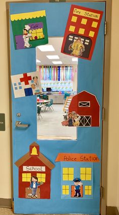 a bulletin board with pictures of school buildings and children's rooms on the door