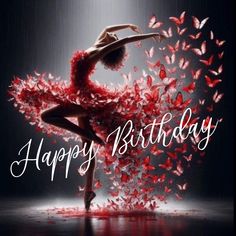 a woman in a red dress is dancing with butterflies around her and the words happy birthday