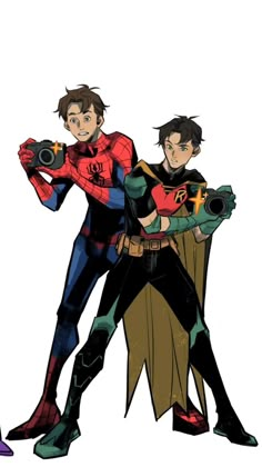 two young men dressed as spider - man and batgirl standing next to each other