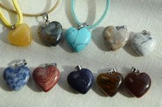 "These are multi-colored gemstone heart shaped healing chakra crystal quartz stone pendants. The pendants are 15 - 16 mm in size with 18\" leather cord necklaces with silver medal clasps. Each necklace has a two inch extension chain to allow you some flexibility in fit. You pick the color of your necklace!! These would make a beautiful present for Valentines Day or any time of the year. If you would like a chain necklace rather than a leather cord necklace just send me a message. I have a variet Handmade Heart Crystal Necklaces For Healing, Heart Pendant Crystal Necklace With Natural Stones, Healing Heart Cut Gemstone Necklace, Spiritual Healing Crystal Necklace With Heart Pendant, Heart-shaped Gemstone Necklace For Healing, Handmade Heart-shaped Crystal Necklaces For Healing, Handmade Heart-shaped Crystal Necklace For Healing, Healing Heart-shaped Crystal Gemstone Necklace, Heart-shaped Healing Necklaces With Natural Stones