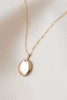 The perfect locket to hold what's most special to you! Our Oval Locket Necklace is simple enough to wear everyday and looks great layered! Gold filled or sterling silver - perfect for everyday wear without tarnishing. AND they’re affordable. Find more at Simple & Dainty! Dainty Oval Pendant Locket Necklace For Anniversary, Oval Locket Necklaces For Mother's Day, Dainty Oval Locket Necklace For Anniversary, Dainty Oval Personalized Locket Necklace, Dainty Personalized Oval Locket Necklace, Mother's Day Oval Locket Necklaces, Oval Locket Jewelry For Everyday, Oval Link Necklaces With Vintage Charm For Gifts, Vintage Charm Oval Link Necklace As Gift