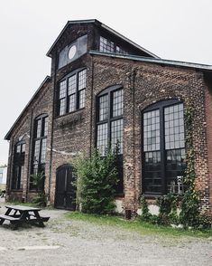 an old brick building with lots of windows