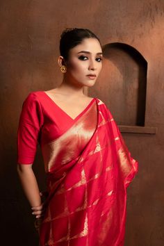 Indulge in luxury with our Handwoven Red Pure Katan by kora Silk Banarasi saree. Meticulously crafted using the timeless cutwork weaving technique, this saree exudes sophistication and exclusivity. Elevate your style with its rich texture and vibrant color, perfect for any special occasion. SKU:0001 Red Katan Silk Pre-draped Saree For Designer Wear, Red Cotton Silk Pre-draped Saree For Wedding, Designer Red Cotton Silk Blouse Piece, Designer Red Pre-draped Saree With Self Design, Elegant Red Cotton Silk Dupatta, Red Cotton Silk Pre-draped Saree With Dupatta, Red Cotton Silk Pre-draped Saree For Designer Wear, Formal Chanderi Sets With Zari Weaving, Red Formal Blouse With Traditional Drape