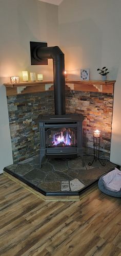 a wood burning stove in the corner of a room