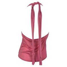 Presenting a fabulous bright pink Gucci knit halter top, designed by Tom Ford. From the late 1990s, this top features a v-neckline, exposed back, and tie at the neck. From over 20 years ago, this top is made complete with the original tags still attached. Add this elevated Gucci by Tom Ford closet staple to your wardrobe! Approximate measurements: Size - XL Bust: free Waist: 30 - 34" Casual Pink Gucci Top, Chic Gucci Luxury Tops, Elegant Sleeveless Gucci Top, Chic Luxury Gucci Tops, Luxury Gucci Summer Top, Luxury Sleeveless Gucci Tops, Chic Gucci Evening Tops, Gucci Knit, Tom Ford Boots