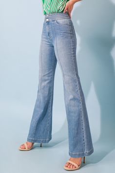 The GRAND PARTY DENIM JEANS features a high-quality washed denim fabric with a wide waistband for added comfort and unique stitching for a stylish look. It has a 2 button and zipper closure, plus front and back pockets and boot-cut leg opening, making it perfect for all occasions. Details Self: 68% Cotton, 20% Polyester, 10% Rayon, 2% Spandex Lining: 95% Polyester, 5% Cotton Size & Fit - Model is 5`8" And Wearing Size Small - Measurements Taken From Size Small - Approx Length: 43.5" Flared Jeans 70s, Velvet Bell Bottoms, Bootleg Jeans, Blue Flare Jeans, Flare Leg Jeans, Bell Bottom Pants, Washed Denim, Leather Shorts, Denim Flares