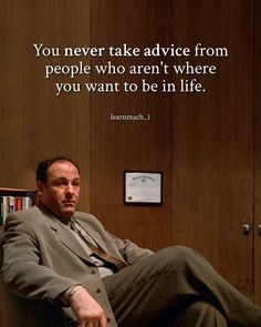 a man sitting on top of a chair in front of a book shelf with a quote above it that reads, you never take advice from people who aren't where you want to be in life