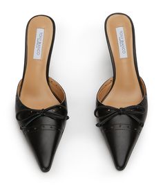 Undeniably chic is Scooter, our vintage inspired black pump. Featuring a pointed closed toe, slender leather bow and dainty perforations, she won't disappoint. -Material: Leather -Sole: Rubber -Fit: True to size -Toe-shape: Pointed -Features: Miniature bow -Heel: 8cm Capsule Shoes, Everlasting Gobstopper, Tony Bianco Heels, Embroidery Heels, Black Pointed Toe Heels, Thigh High Boots Flat, Designer Shoe, Embellished Heels, Metallic Shoes