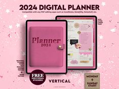 a pink planner book sitting on top of a table