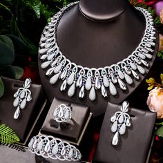 CZ Jewelry- Famous Brand Bling Sequins Luxury Africa Dubai Jewelry Sets For Women Wedding Party Zircon Wedding Bridal Jewelry Set GiftModel Number:1005003446713808Pakcage list1 pair earring ;1pc necklace;1pc ring;1pc bangleMaterial: 18K Gold/White Gold Plated +100% AAA Cubic Zirconia DiamondWearing Occasion: Daliy Wear / Party / Anniversary / WeddingGift for: Girl friend / Wife / Mom / YourselfThis jewelry accord with the eu environmental requirements100% 18K Gold/White Gold Plated Wedding Jewel