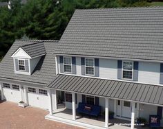 an aerial view of a two story house