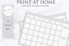 the print at home planner is shown in grey and white