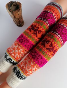 Wonderful Muhu pattern wool knitted leg warmers, knitted from natural lamb wool. Full of colour, fun and magic. Medium model size. Nice winter accessories, soft and comfortable to wear. Multicolor pattern, what is uniquely created at Muhu Island in Estonia. As many pattern, as many colors as possible. Truly eye catcher. Traditional Estonian Muhu stocking pattern - ideas taken from Muhu etnic knittings. Ideal for cold day, perfect for walking or sport activities outside, fun vintage fashion acces Multicolor Knitted Leg Warmers For Fall, Multicolor Knitted Leg Warmers For Winter, Nordic Multicolor Hand Knitted Patterns, Folk Style Multicolor Shawl With Motifs, Estonian Pattern, Style Leg Warmers, Activities Outside, Outside Fun, Wool Stockings