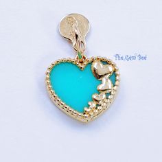 Thank you for coming in! Genuine 14K yellow GOLD diamond charm pendant with beautiful teal blue Turquoise stone and love heart design! THEY ARE STAMPED WITH "14K ITALY", but I could not show it clearly in the pictures. DIMENSION: 10.8mmX11.6mm(plus 5mmx7mm bail), 3.6mmx4.8mm hole MATERIAL: 14K yellow Gold,  Turquoise Turquoise Heart Charm Pendant Jewelry, Green Heart-shaped Charms Jewelry, Turquoise Jewelry With Heart Charm For Anniversary, Turquoise Heart Charm Jewelry For Anniversary, Turquoise Jewelry With Heart Charm, Turquoise Heart Cut Jewelry With Heart Charm, Turquoise Heart-cut Jewelry With Heart Charm, Love Heart Design, Heart Charm Necklace