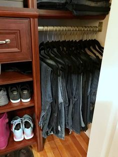 a closet filled with lots of clothes and shoes