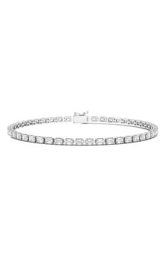 Emerald-cut lab-grown diamonds are prong-set along this timeless tennis bracelet. Total lab-grown diamond weight: 6.69ct. Color: F Clarity: VS1 14k gold/lab-grown diamond Made in the USA >Diamond Guide Women's Bracelets, Diamond Tennis Bracelet, Diamond Guide, Tennis Bracelet Diamond, Lab Created Diamonds, Tennis Bracelet, Emerald Cut, Womens Bracelets, Prong Setting