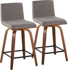 pair of modern bar stools with wood legs in grey fabric upholstered seat