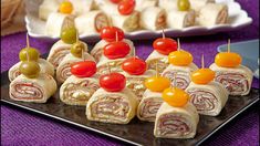 an assortment of appetizers are displayed on a tray