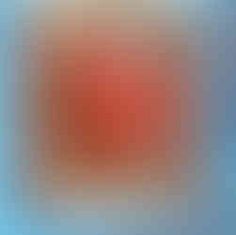 blurry image of an orange and blue background