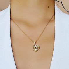 Unfold your divine grace with this exquisite necklace. • Divine Love and Compassion • Purity and Devotion • Inner Blossoming • Meditative Focus Pendant Dimensions: 0.59''x 0.59'' x 0.12'' Material:18k Gold Vermeil Elegant Clavicle Chain Jewelry As Gift For Mom, Elegant Clavicle Chain Jewelry Gift For Mom, Elegant Rose Gold Charm Necklaces For Mother's Day, Rose Gold Pendant Jewelry Gift For Mom, Rose Gold Clavicle Chain Necklace With Flower Pendant, Rose Gold Clavicle Chain Necklace For Mother's Day, Elegant Heart Pendant Jewelry With Flower Charm, Gold Heart Pendant Necklace With Rose Design, Gold Necklace With Rose Design Heart Pendant