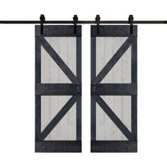 two wooden doors with metal bars on each side