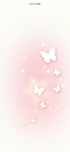 a pink background with white butterflies flying in the air