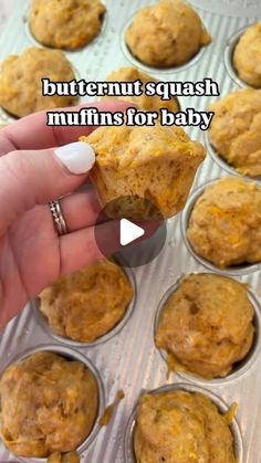 a hand holding a muffin in a muffin tin with the words butternut squash muffins for baby