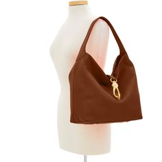 Soft and Chic     The Logo Lock Shoulder Bag owes its soft, slouchy shape and understated style to natural Florentine leather. A gold plated closure keeps contents secure, a wide shoulder strap guarantees comfort and a roomy interior provides great storage space. Both casual and chic, this bag will take you from workday lunches to Sunday brunches with ease. Classic Gold Hobo Bag With Gold-tone Hardware, Gold Smooth Grain Shoulder Bag For Everyday Use, Gold Shoulder Bag With Smooth Grain For Everyday, Everyday Gold Shoulder Bag With Smooth Grain, Gold Smooth Grain Shoulder Bag For Everyday, Everyday Gold Smooth Grain Shoulder Bag, Elegant Hobo Bag With Brass Hardware For Daily Use, Gold Soft Leather Hobo Bag For Daily Use, Everyday Gold Leather Hobo Bag