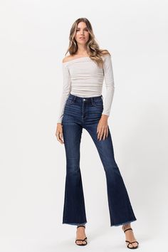 Another must-have essential for your wardrobe! These dark wash classic flares sit higher on the waist, while slim through the legs with a tapered out flare leg opening for a flattering look. Made with premium soft stretch & recovery fabric. *Closure: Button and zipper. *Five pockets. *Frayed Hem. *Stretch. Rise - 10" Inseam - 32" Fabric 66% Cotton 22% Polyester 10% Rayon 2% Spandex She Is Clothed, Dark Indigo, High Jeans, Bell Bottom Jeans, Fashion Boutique, Flare Jeans, Must Haves, Jeans Size, High Rise