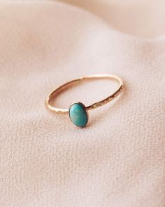 -Turquoise Oval Cabochon Ring -Sky-blue turquoise color with a mix of both dark and golden-yellow matrix -14K Gold Filled -Size 4-12 -Please note there are slight color variations or an appearance of a seam where the joints of the ring has been soldered. Due to their handmade nature, keep in mind that solder marks are visible and normal to have. Oval Turquoise Rings In 14k Gold, 14k Gold Turquoise Oval Rings, 14k Gold Turquoise Oval Cabochon Ring Gift, Oval Turquoise Birthstone Ring, Minimalist Oval Turquoise Gemstone Ring, Minimalist Turquoise Oval Ring, Rope Rings, Hand Stamped Ring, Stamped Rings