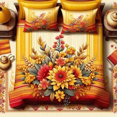 a bed with yellow and red flowers on the comforter, next to an orange pillow