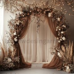 an arch decorated with flowers and greenery in front of a white curtained wall