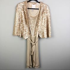 Absolutely Stunning Set By Iisli!! Gold Crochet Blazer Style Jacket Covered In Matte Gold Sequins. (See Tag As There Is Natural Distressed Look On Some Sequins). Button Front. Dress Is A Tank Style Sleeveless Dress With Gold Sequin Paneling On The Front And Back. Gold Glitter Material Pleated Skirt Bottom With Belted Waist. Great Preowned Condition!! The Dress Is A Size Small And The Jacket Is A Size 6. Fitted Jacket Dress For Spring Party, Vintage Spring Dresses For Dinner, Fitted Outerwear For Cocktail In Spring, Spring Vintage Dinner Dresses, Spring Cocktail Jacket Dress With Long Sleeves, Fitted Fall Cocktail Jacket Dress, Long Sleeve Jacket Dress For Spring Cocktail, Spring Cocktail Long Sleeve Jacket Dress, Fitted Jacket Dress For Evening In Spring