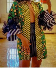 It's a hand made finish Ankara Jacket, with ruffle organza on the sleeve. This outfit can be style as causal or corporate. Ankara Blazer, African Jacket, Ankara Kimono, Ankara Jackets, Mode Kimono, Afrikaanse Mode, African Wear Dresses, African Fashion Women Clothing, African Print Dress