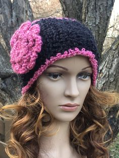 "This is a beautiful and warm Hand Crochet Ear Warmer that will certainly keep your head and ears warm during the winter months.  I used Lion Brand Homespun yarn which is always thick and warm.  The Ear Warmers are crocheted in black and highlighted with a pink border and pink crochet flower on the side.   If you are not a hat person but want to keep your ears warm and look fashionable at the same time . . . the ear warmer is the way to go.   The Ear Warmers are 88% Acrylic and 12% Polyester and Crochet Ear Warmers, Fleece Headbands, Pink Border, Crochet Ear Warmer, Denim Shoulder Bags, Ear Warmer Headband, Pink Crochet, Flower Black, Black Headband