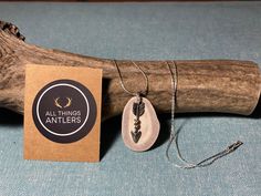 These necklaces are 20 inch chains, with a hand selected and sanded section of real deer antler chosen for its natural colors and accents. You can choose your overlaid charm when you order. We have an arrow, and heart option for these, and would be happy to make a custom order for you as well. Every one will be unique and the color of antler can vary from light champagne and cream tones, to purple storm clouds. We can also makes your slice of antler thicker or thinner depending on your preferenc Rustic Arrowhead Necklace For Gift, Purple Storm, Snake Tank, Antler Earrings, Small Deer, Shed Antlers, An Arrow, Cream Tones, Gold Flecks