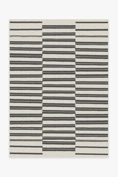 a black and white rug with horizontal stripes