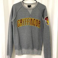 Nwot Authentic Harry Potter Gryffendor Pullover From Universal Studios. It Was A Gift And The Tabs Were Removed But I Never Wore It. I’m Slytherin House! Gryffindor Clothes, Gryffindor Sweater, Hogwarts Clothes, Harry Potter Houses Outfits, Harry Potter Sweater, Hogwarts Uniform, Harry Potter Universal Studios, Slytherin House, Harry Potter Outfits