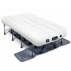 an inflatable mattress is sitting on top of a snowboard with two legs