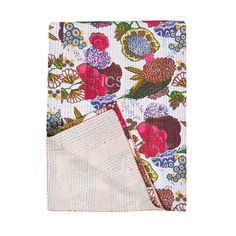 two pieces of cloth with flowers on them, one is white and the other is pink