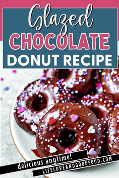 glazed chocolate donuts on a plate with sprinkles