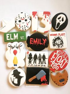 decorated cookies are arranged in the shape of letters and numbers, including characters from tv shows