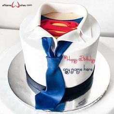 a birthday cake with a superman shirt and tie on the top is for someone's birthday