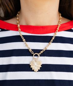 This vintage inspired gold toggle necklace with a heart charm is more than just a pretty piece—it's a daily reminder to love yourself and share that love with the world. The charm hangs on a beautifully unique chain, adding a trendy twist to your everyday look. Whether you’re dressing up or keeping it casual, this necklace is a stylish way to spread love and kindness wherever you go! Features • Gold plated brass • Measures 15.5” plus a 3” extender, 1.5” dropdown heart Metal Necklaces With Heart Pendant And Toggle Clasp, Trendy Gold-plated Heart Charm Necklace, Gold-tone Heart Pendant Necklace With Lobster Clasp, Gold Heart Pendant Toggle Necklace, Gold Toggle Necklace With Heart Pendant, Heart Pendant Toggle Necklace With Adjustable Chain, Gold Heart Necklace With Toggle Clasp Gift, Trendy Jewelry With Heart Pendant And Toggle Clasp, Gold Charm Necklaces With Toggle Clasp