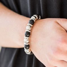 A Collection Of Silver Accents And Earthy Black Stones Are Threaded Along A Stretchy Band For A Seasonal Look. (1001) Black Metal Bracelet With Silver Beads, Beach Wedding Red, Suede Bracelet, Orange Bracelet, Feather Bracelet, Purple Bracelet, Black Stones, Black Bracelet, Hinged Bracelet