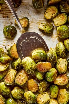 grilled brussel sprouts and bacon on a grill